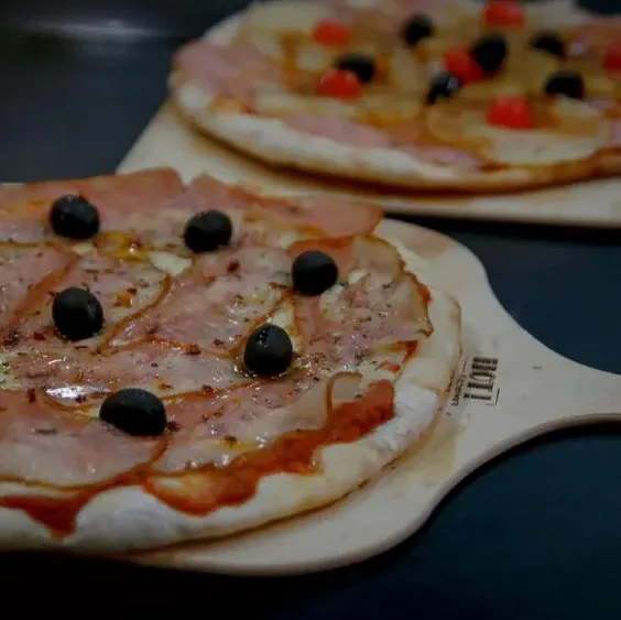 Costumbres Argentinas pizzas en tabla